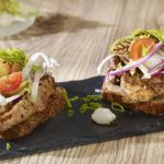 Grilled Pork Neck with Horseradish, Cranberries, and Salad